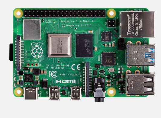 Raspberry Pi 4 Model B board with various connectors on a green background