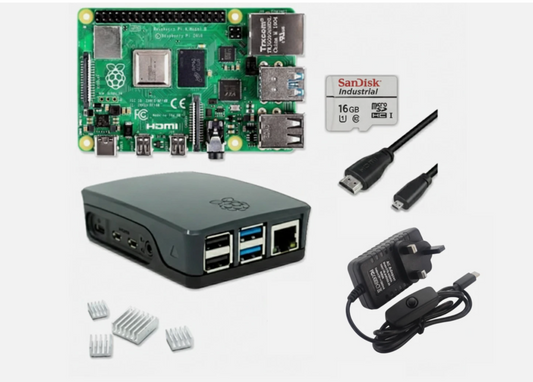 Raspberry Pi kit with power adapter, microSD card, and heat sinks on a white background